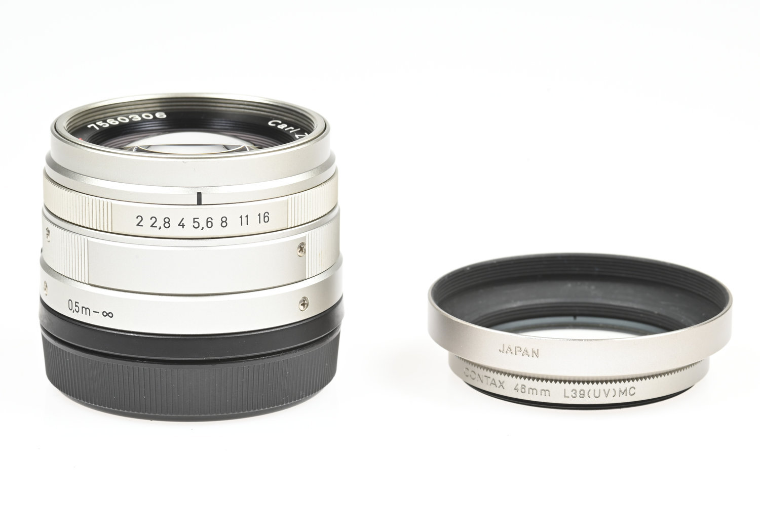 Gelegenheit Contax Carl Zeiss Planar 45/2 T* + Contax GG-1 Metallgegenlichtblende + Contax 46mm L39 UV MC Filter Zustand A